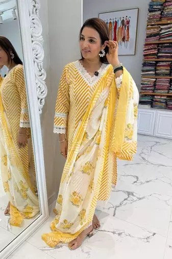 Beautiful yellow cotton kurta set with blue floral strippedroidery