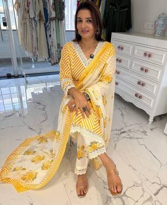 Beautiful yellow cotton kurta set with blue floral strippedroidery 3