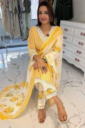 Beautiful yellow cotton kurta set with blue floral strippedroidery