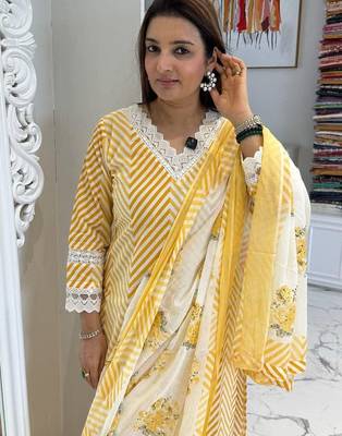 Beautiful yellow cotton kurta set with blue floral strippedroidery 4