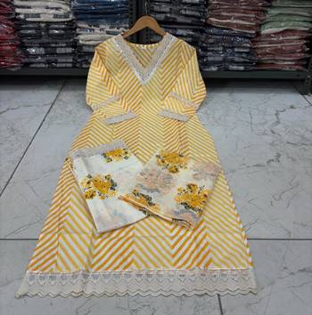 Beautiful yellow cotton kurta set with blue floral strippedroidery 5