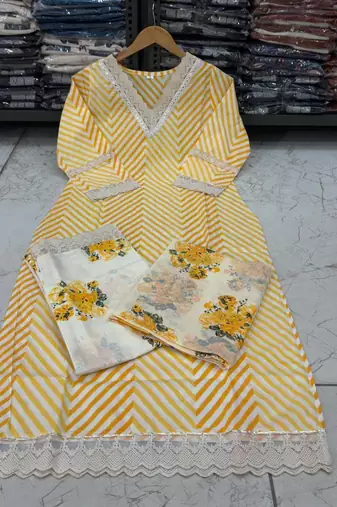 Beautiful yellow cotton kurta set with blue floral strippedroidery