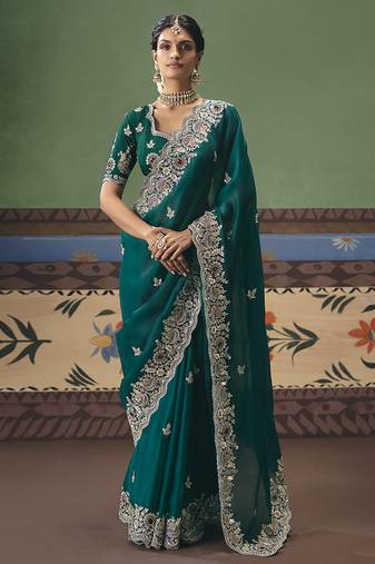 Teal fancy fabric embroidered saree