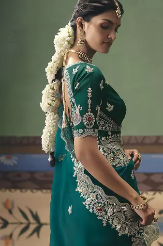 Teal fancy fabric embroidered saree