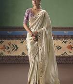 Cream fancy fabric embroidered saree