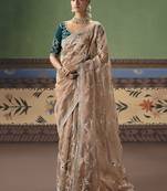 Beige fancy fabric embroidered saree