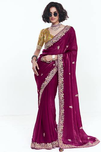 Fancy fabric embroidered rani pink saree