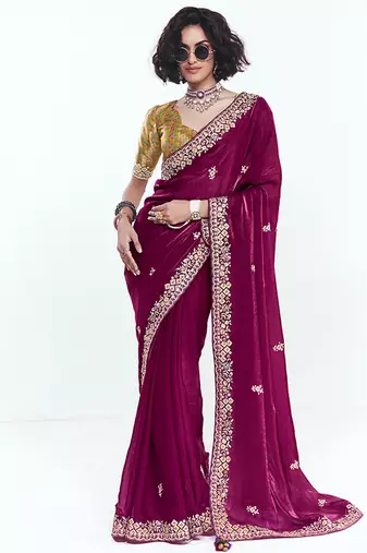 Fancy fabric embroidered rani pink saree