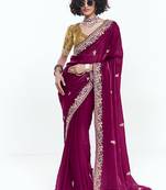 Fancy fabric embroidered rani pink saree