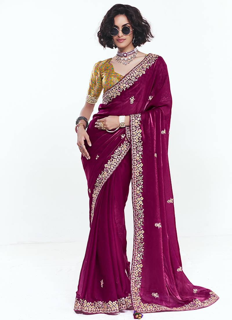 Fancy fabric embroidered rani pink saree