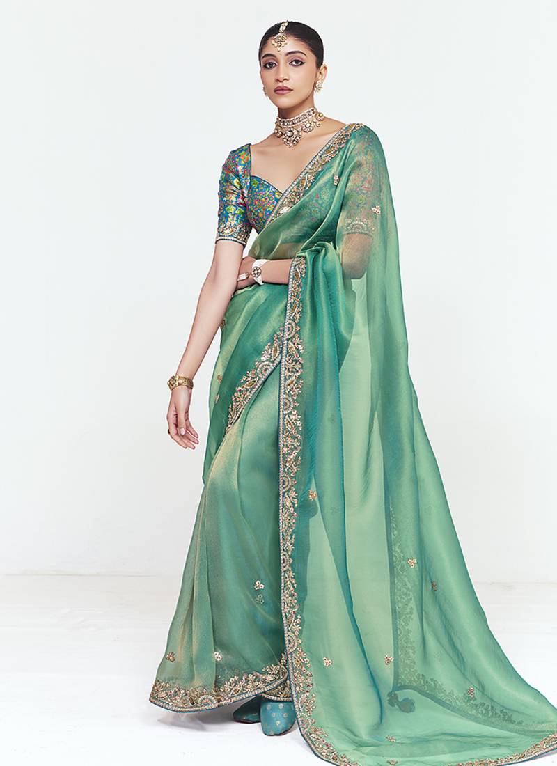 Fancy fabric embroidered sea green saree