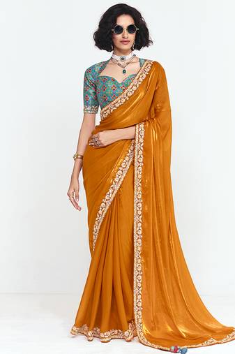 Fancy fabric embroidered orange saree