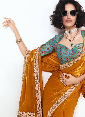 Fancy fabric embroidered orange saree 2