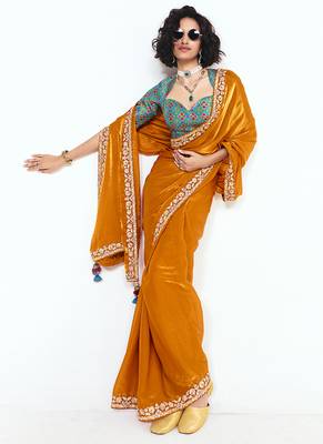 Fancy fabric embroidered orange saree 3