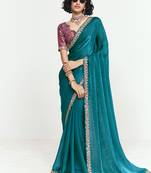 Fancy fabric embroidered teal saree