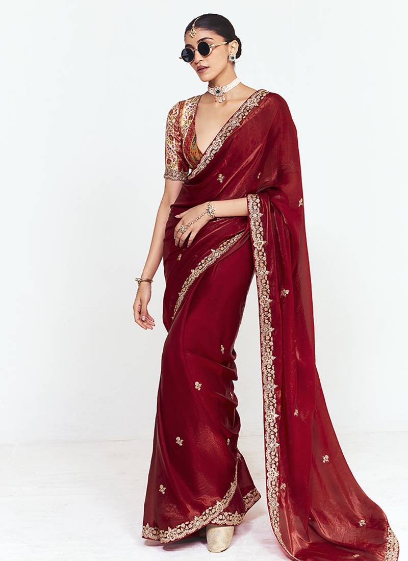Fancy fabric embroidered maroon saree