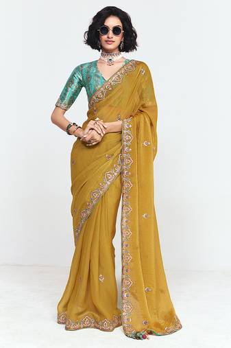 Fancy fabric embroidered mustard saree