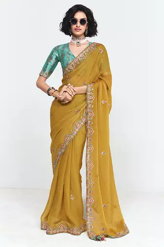Fancy fabric embroidered mustard saree