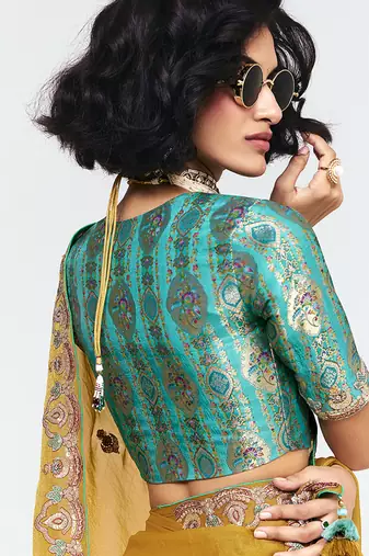 Fancy fabric embroidered mustard saree