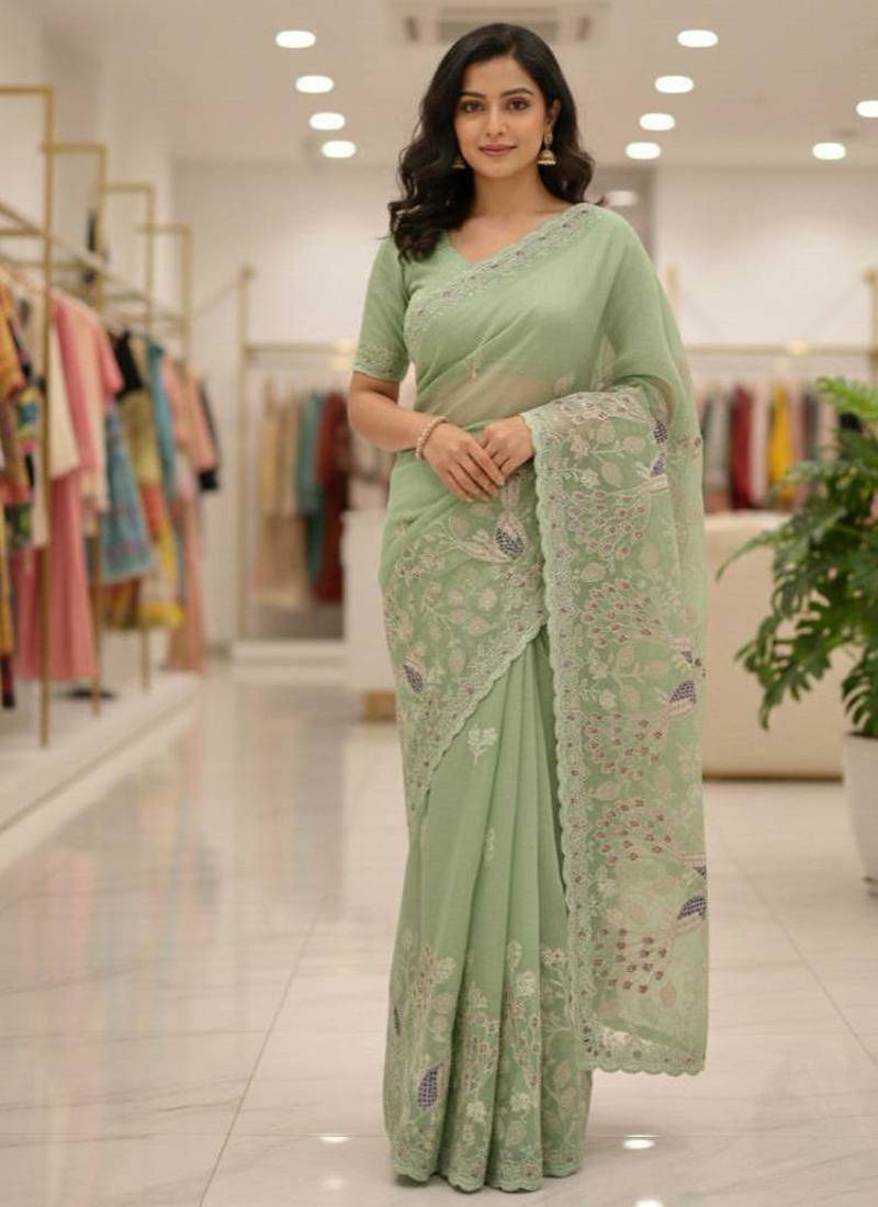 Light Green color embroidery and cut work border Crunchy silk Saree