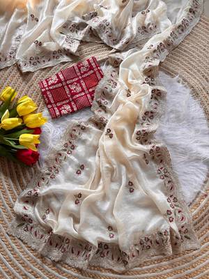 cream shimmer silk embroidered saree with red blouse 2