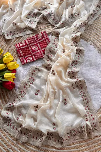 cream shimmer silk embroidered saree with red blouse