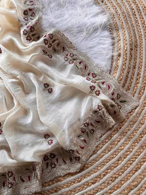 cream shimmer silk embroidered saree with red blouse 4
