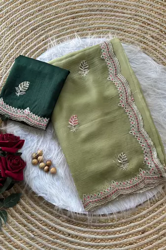 Parrot Green color Embroidery and detailed border work chiffon saree