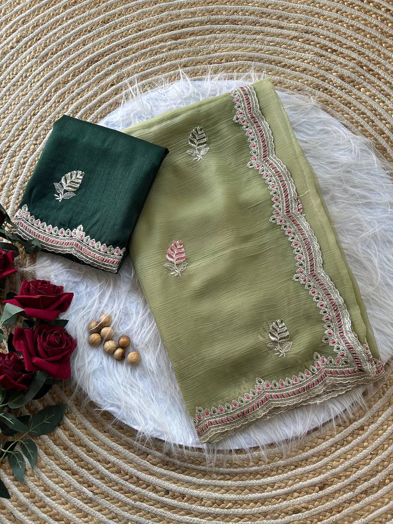 Parrot Green color Embroidery and detailed border work chiffon saree