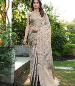 grey organza silk saree with heavy zari detailing