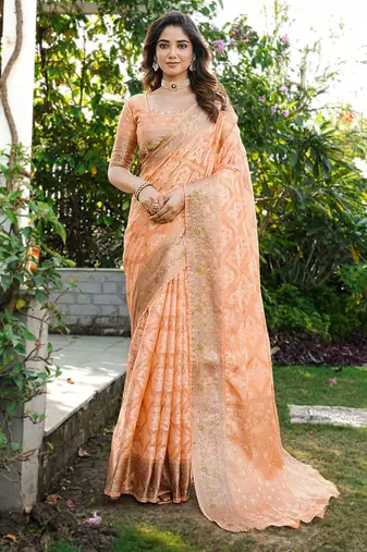 Peach organza silk bandhani patola weaves saree with matching blouse piece
