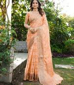 peach organza silk saree with heavy zari detailing