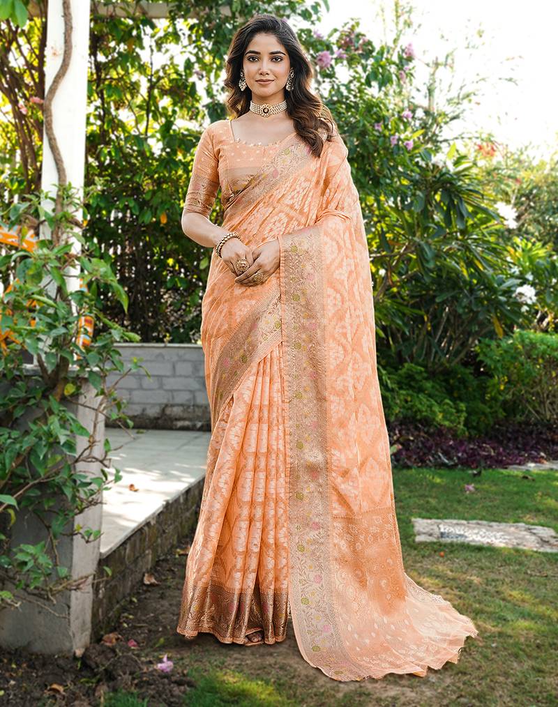 Peach organza silk bandhani patola weaves saree with matching blouse piece