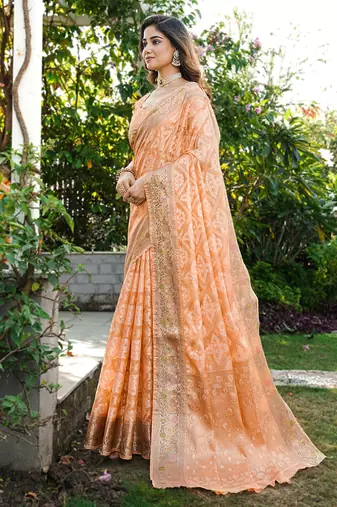 peach organza silk saree with heavy zari detailing