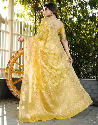 yellow organza silk saree with floral woven border 2