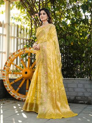 yellow organza silk saree with floral woven border 1