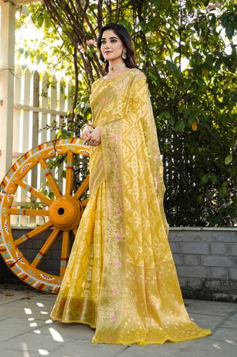 Yellow organza silk bandhani patola weaves saree with matching blouse piece\