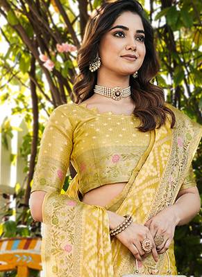 yellow organza silk saree with floral woven border 3