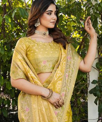 yellow organza silk saree with floral woven border 4