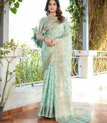 sea green organza silk saree with bandhani patola weaves
