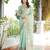 Sea green organza silk bandhani patola weaves saree with matching blouse piece