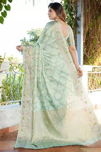 sea green organza silk saree with bandhani patola weaves