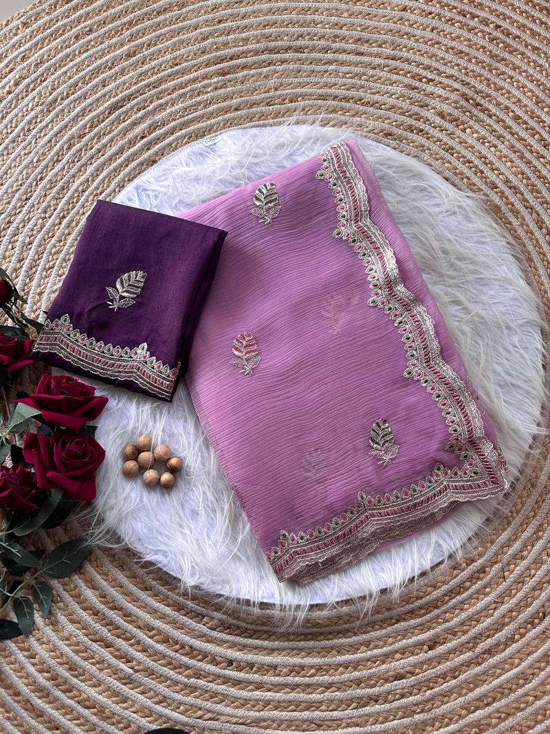 Pink color Embroidery and detailed border work chiffon saree