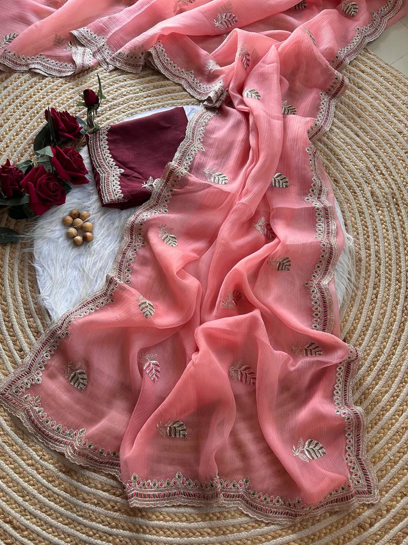 Peach color Embroidery and detailed border work chiffon saree
