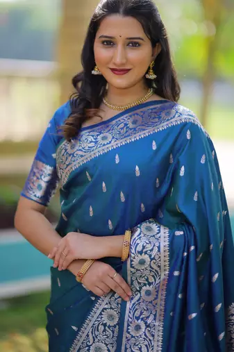 Teal soft banarasi silk zari weaving saree with matching blouse piece