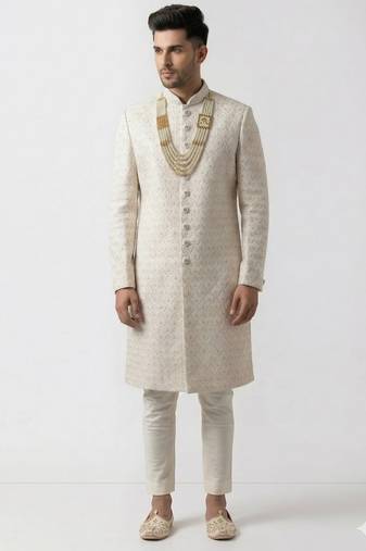 white silk sherwani with detailed hand embroidery