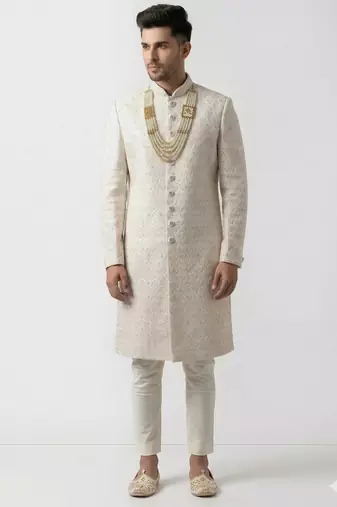 white silk sherwani with detailed hand embroidery