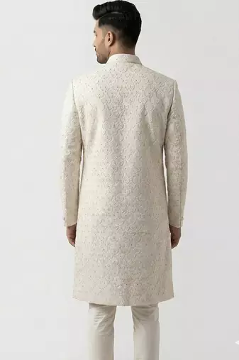 white silk sherwani with detailed hand embroidery