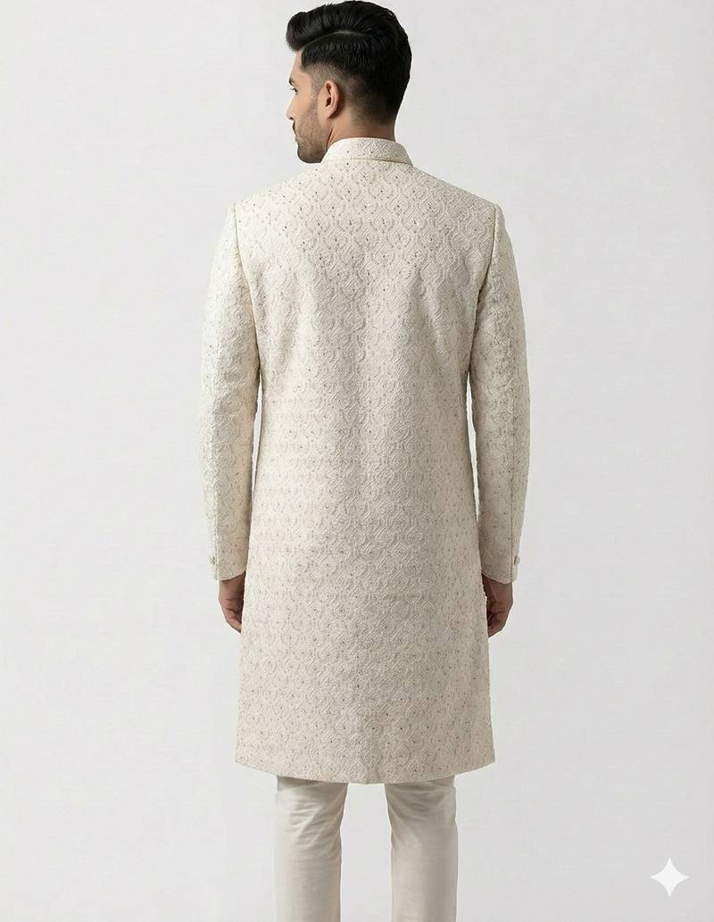 white silk sherwani with detailed hand embroidery