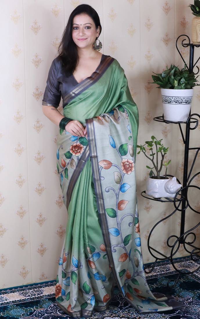 Green tussar silk kalamkari print zari woven border saree with contrast blouse piece